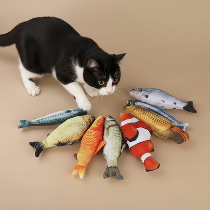 Colorful fish-shaped toys on a wooden surface with a book and flowers.