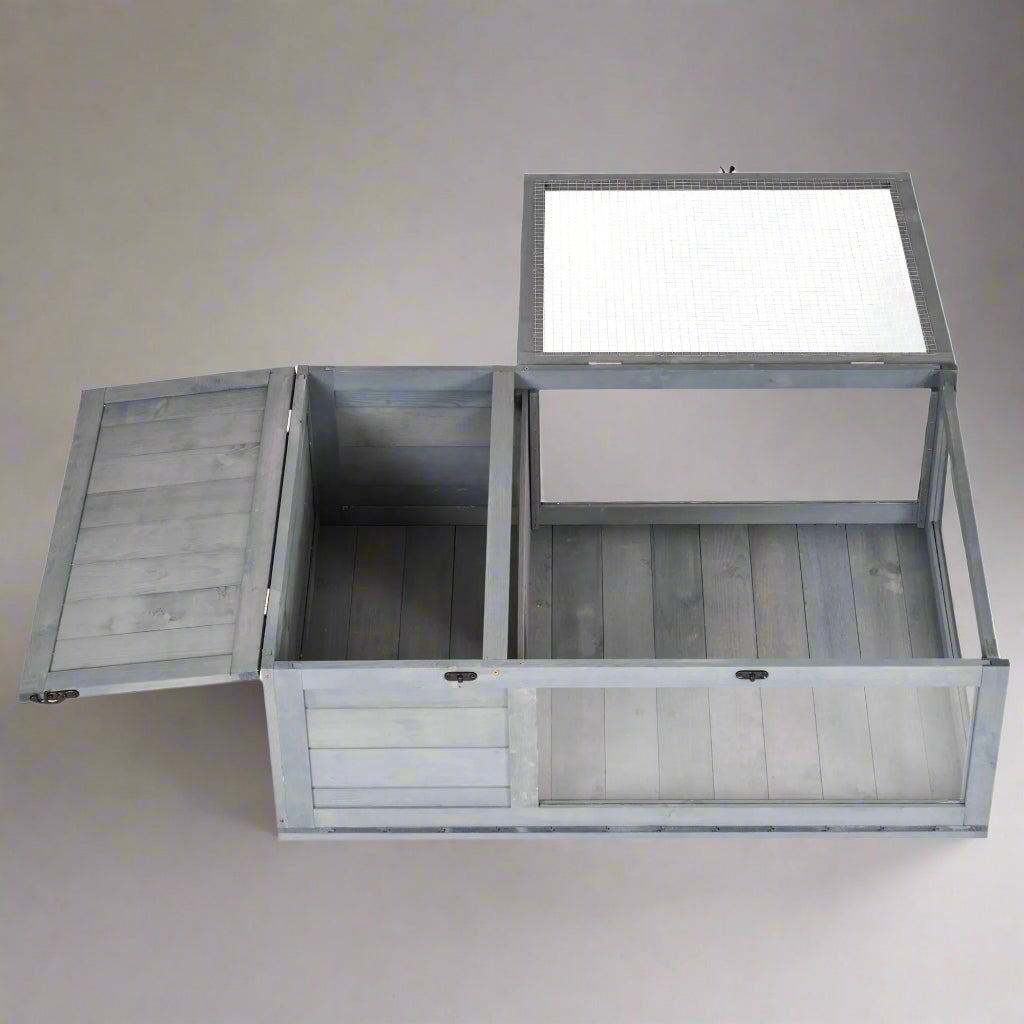 Wooden storage box with a lid on a white background