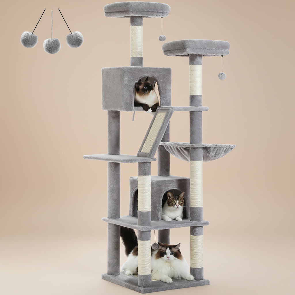 Gray cat tree with multiple levels and a cats sitting on the shelves.